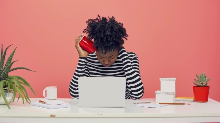 picture showing lady thinking about her office problems