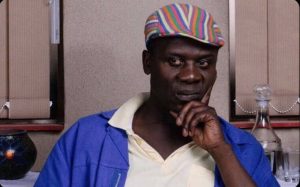 Picture showing a Nigerian parent with a funny look on his face