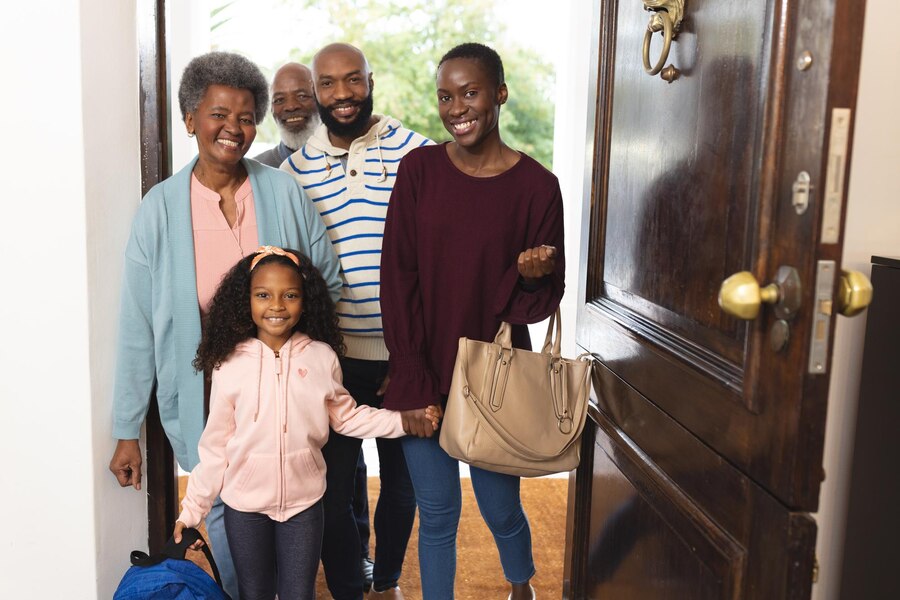 picture showing parents dropping of their kids with their grandparents