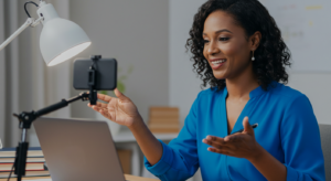 picture showing a woman speaking at a virtual webinar