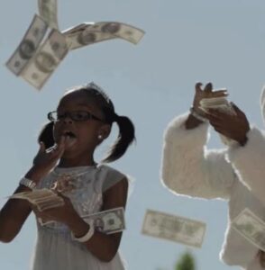 Spraying money in the air