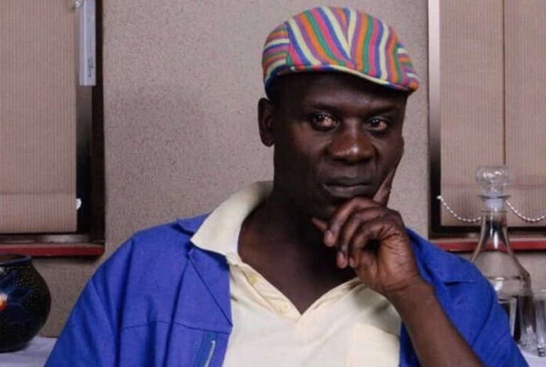 Picture showing a Nigerian parent with a funny look on his face