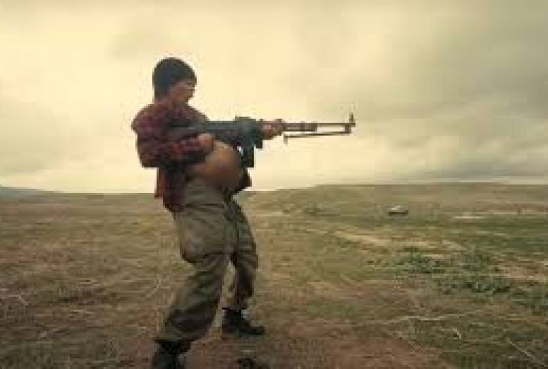 picture showing a pregnant woman wielding a lethal weapon